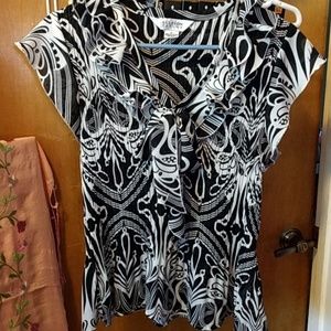 Black and white ruffled sleeveless dress blouse